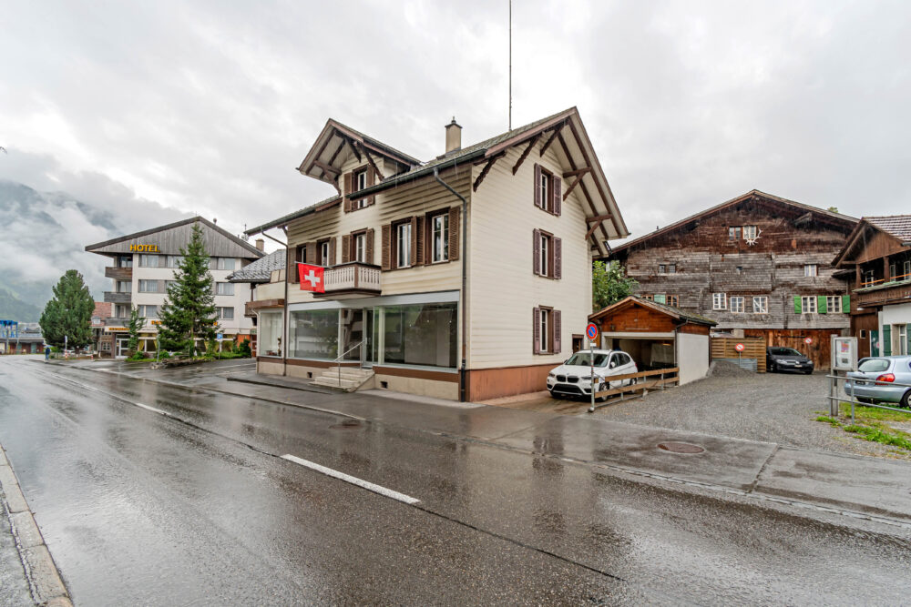 With parking spaces and garage